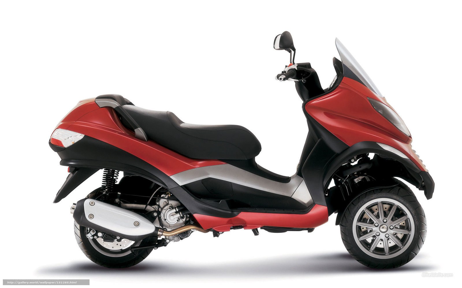 red three-wheeled scooter