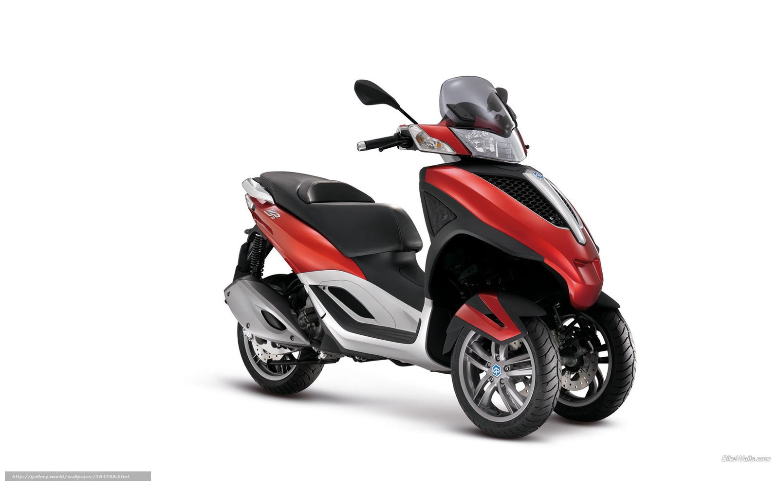 red three-wheeled scooter