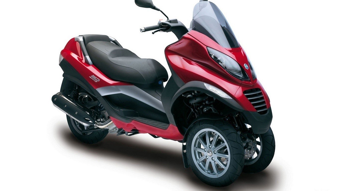 red three-wheeled scooter