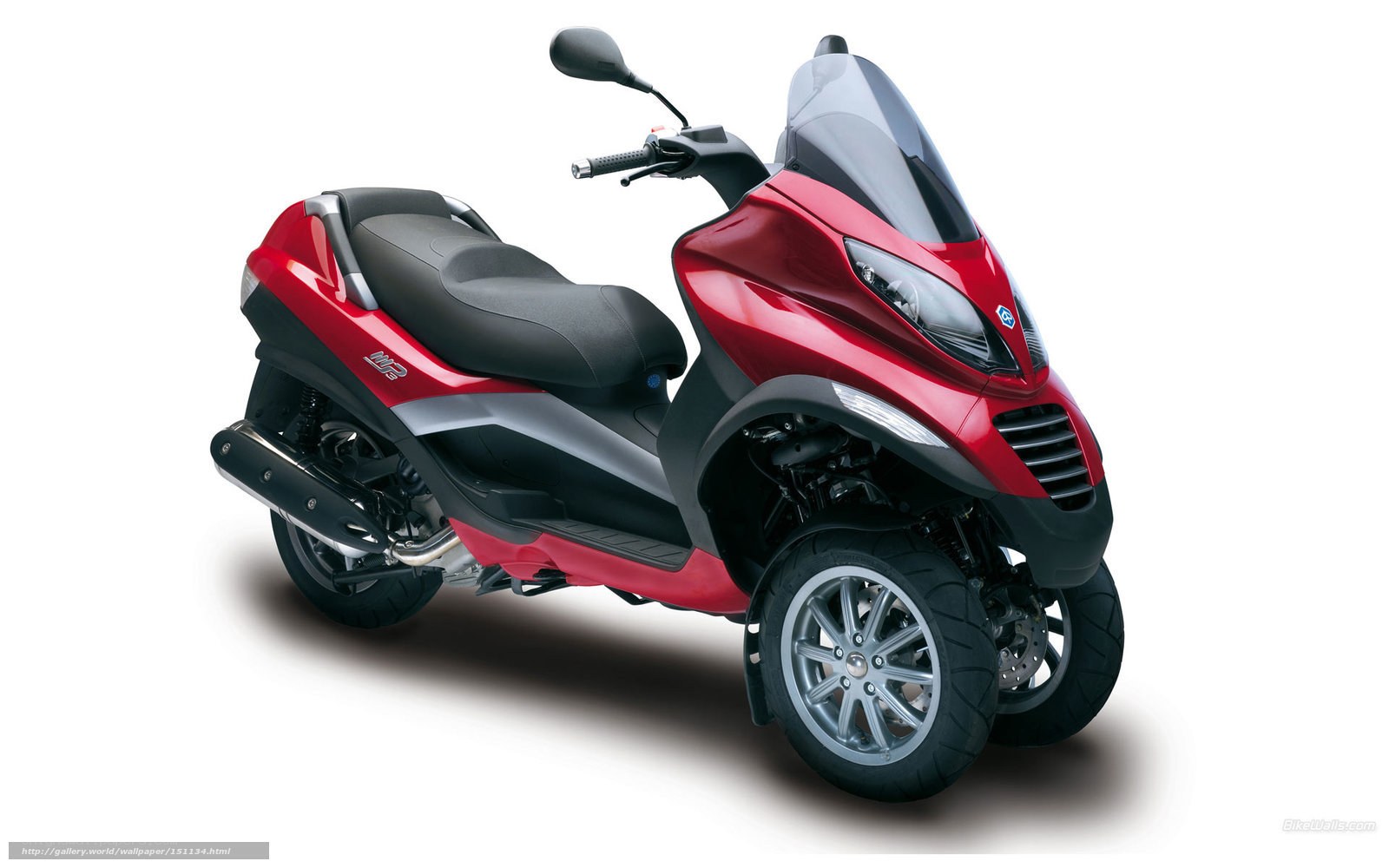 Red three-wheeled scooter