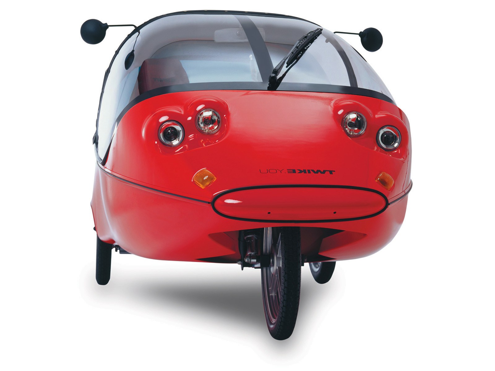 Red three-wheeled vehicle