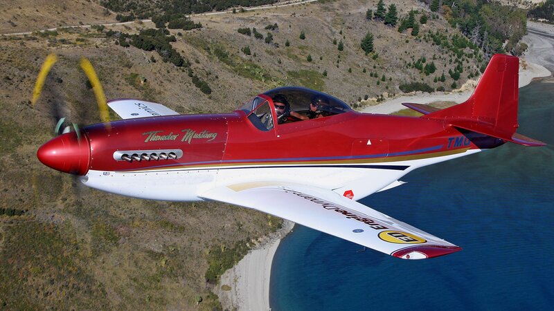 Red Thunder Mustang in flight