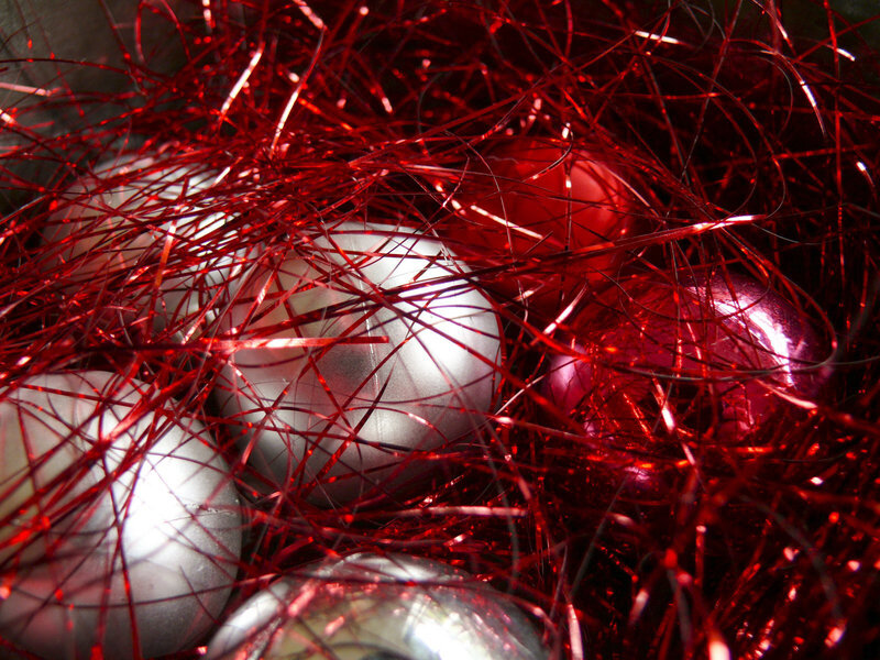 Red tinsel with ornaments