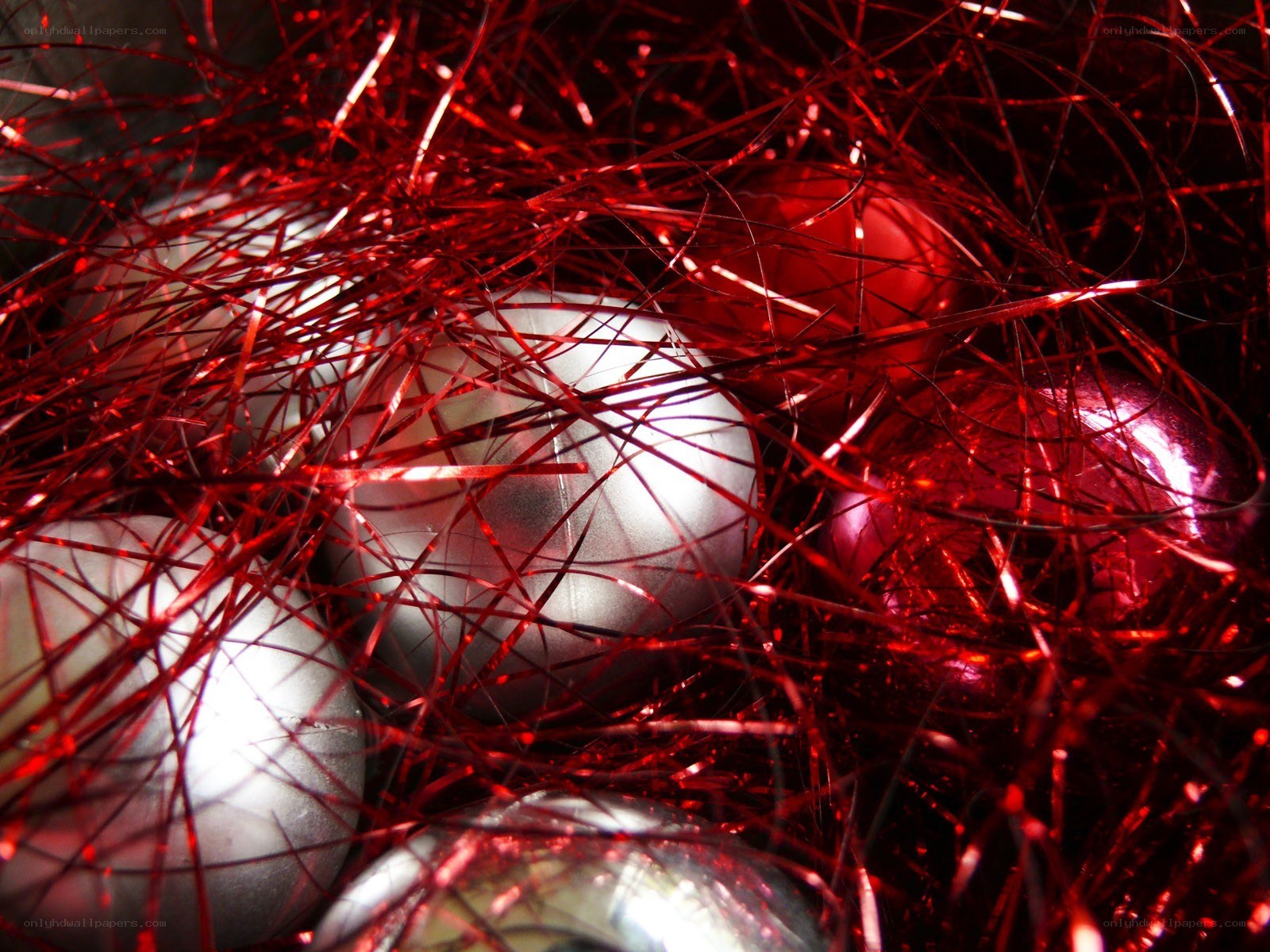 red tinsel with ornaments