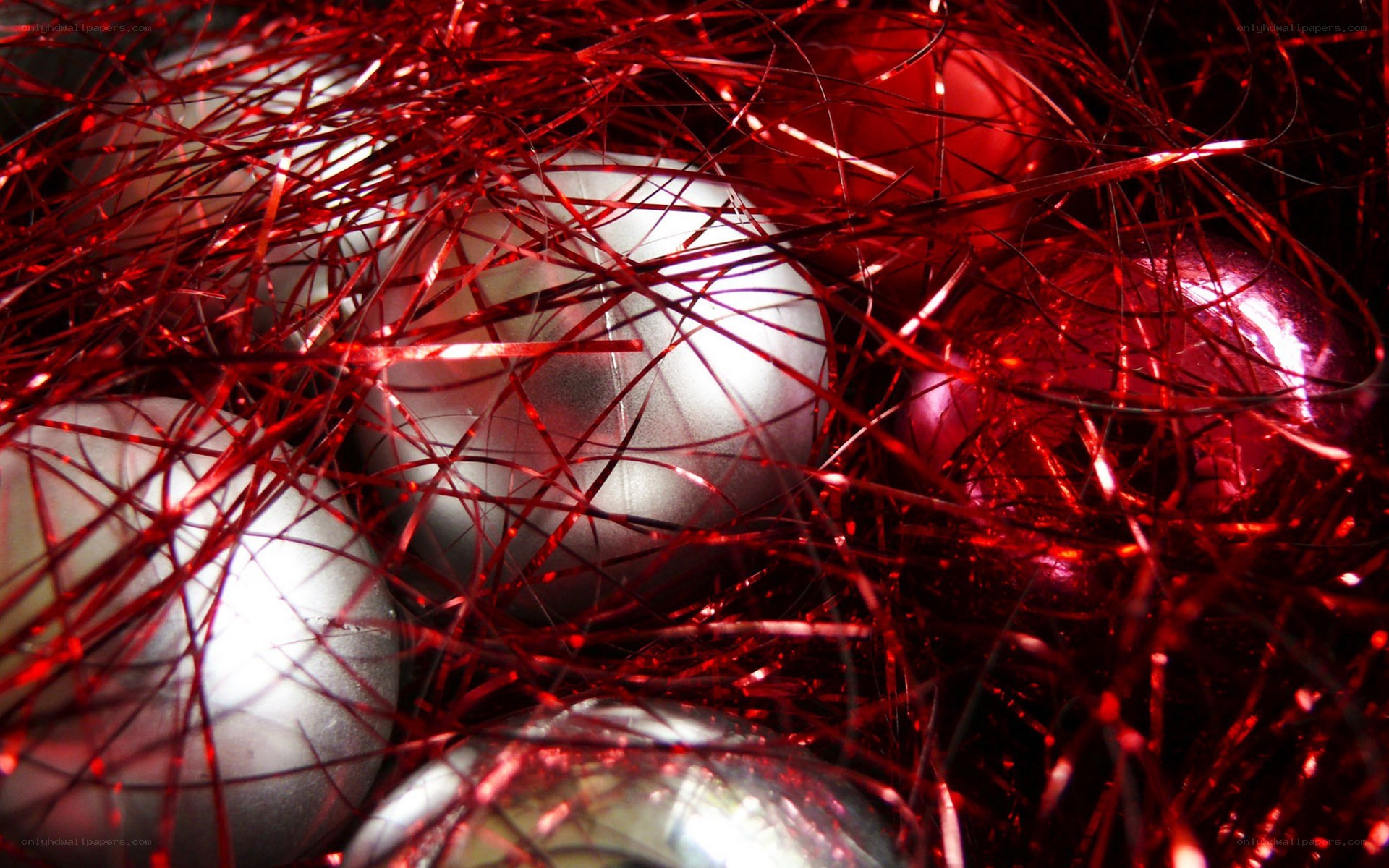 red tinsel with ornaments