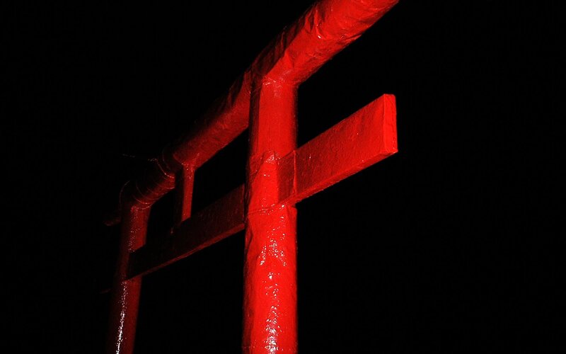 Red torii gate at night