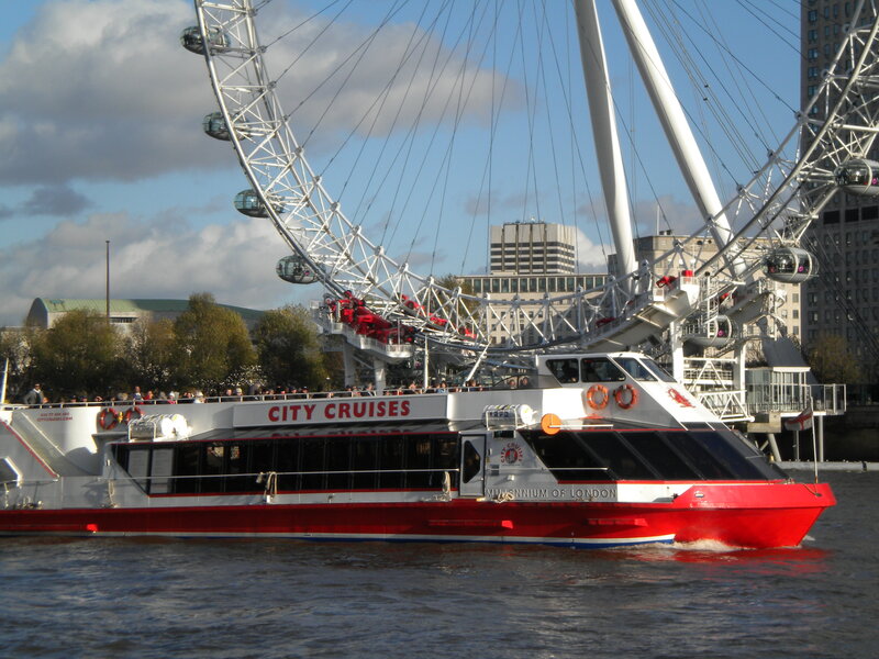 Red Tour Boat on River