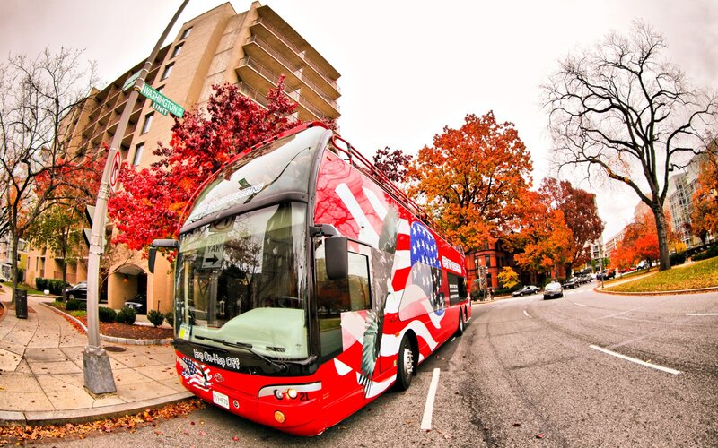 Red Tour Bus on Street