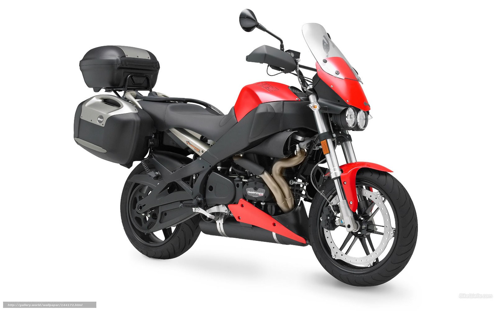 red touring motorcycle with luggage