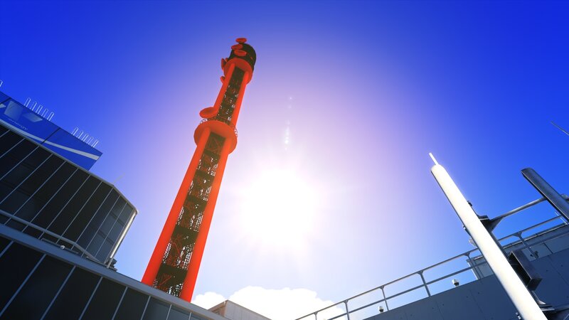Red tower against blue sky