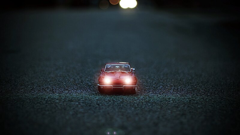 Red Toy Car on Road