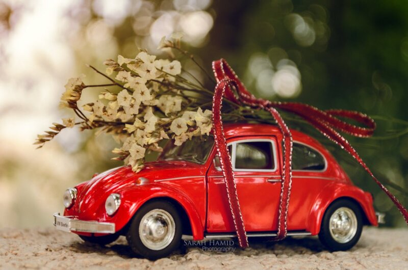 Red Toy Car with Flowers