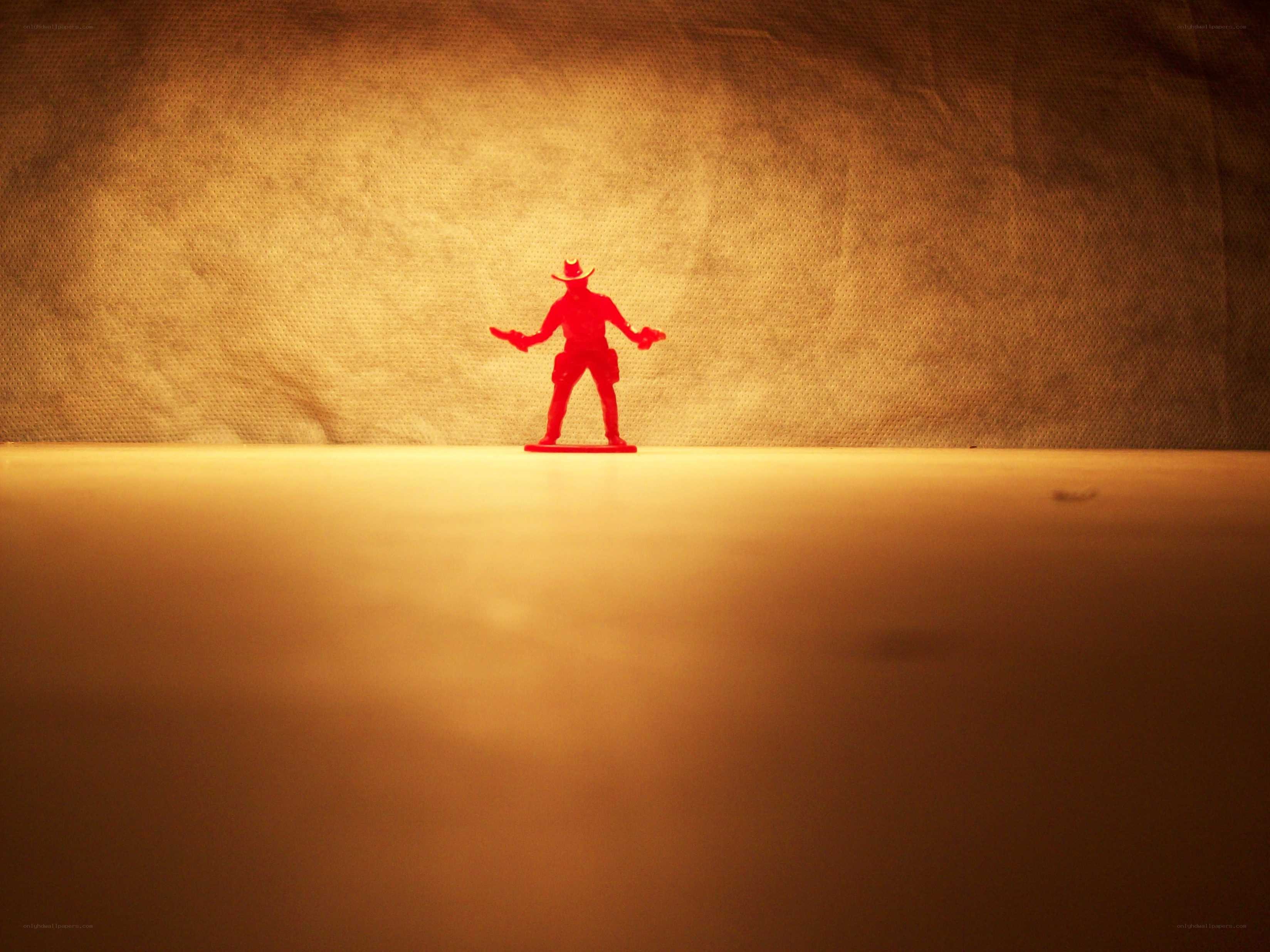 Red toy cowboy figure