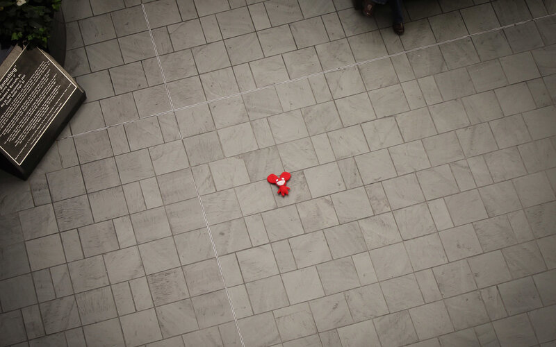 Red toy on tiled floor