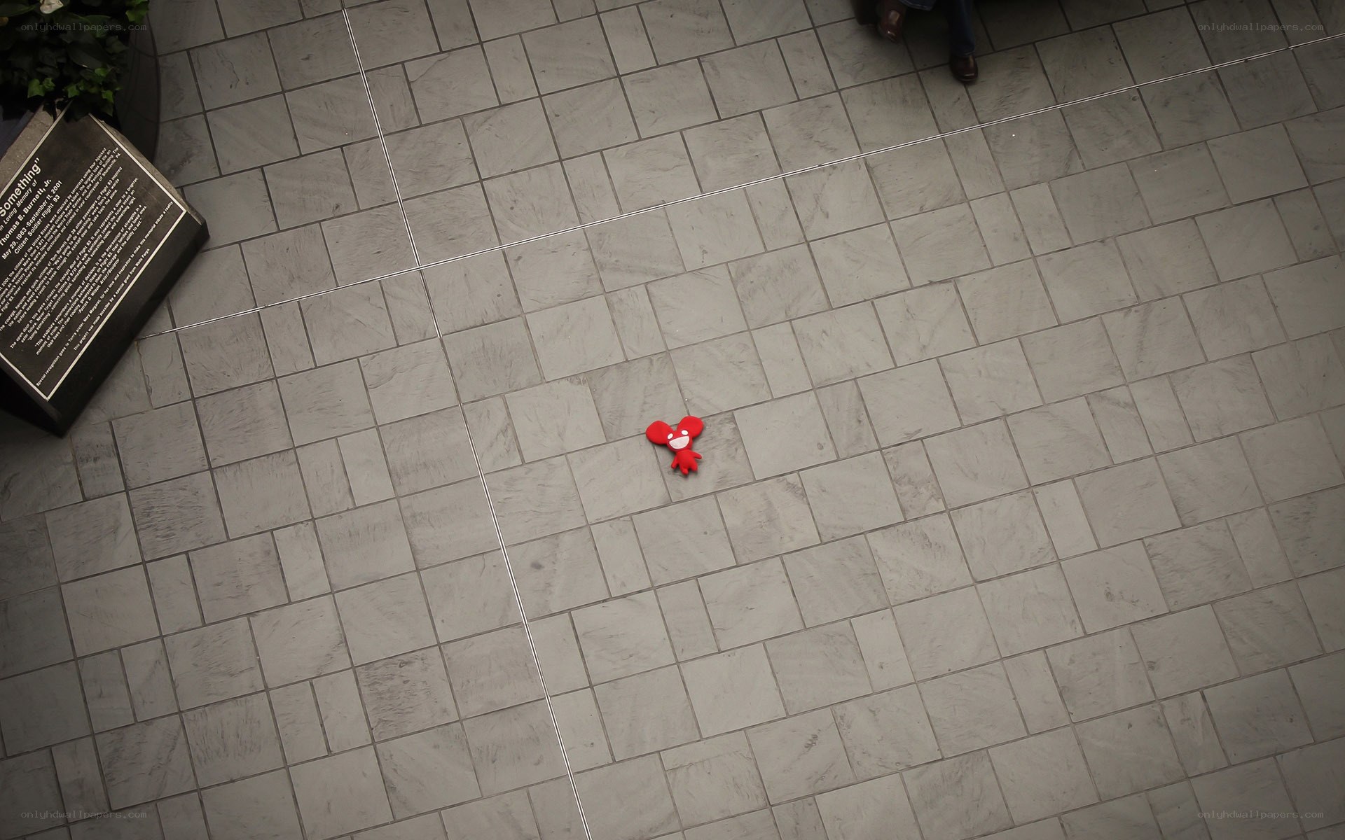 Red toy on tiled floor