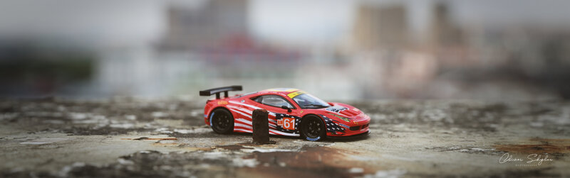 Red Toy Race Car — Dramatic, Photograph, Toy Car