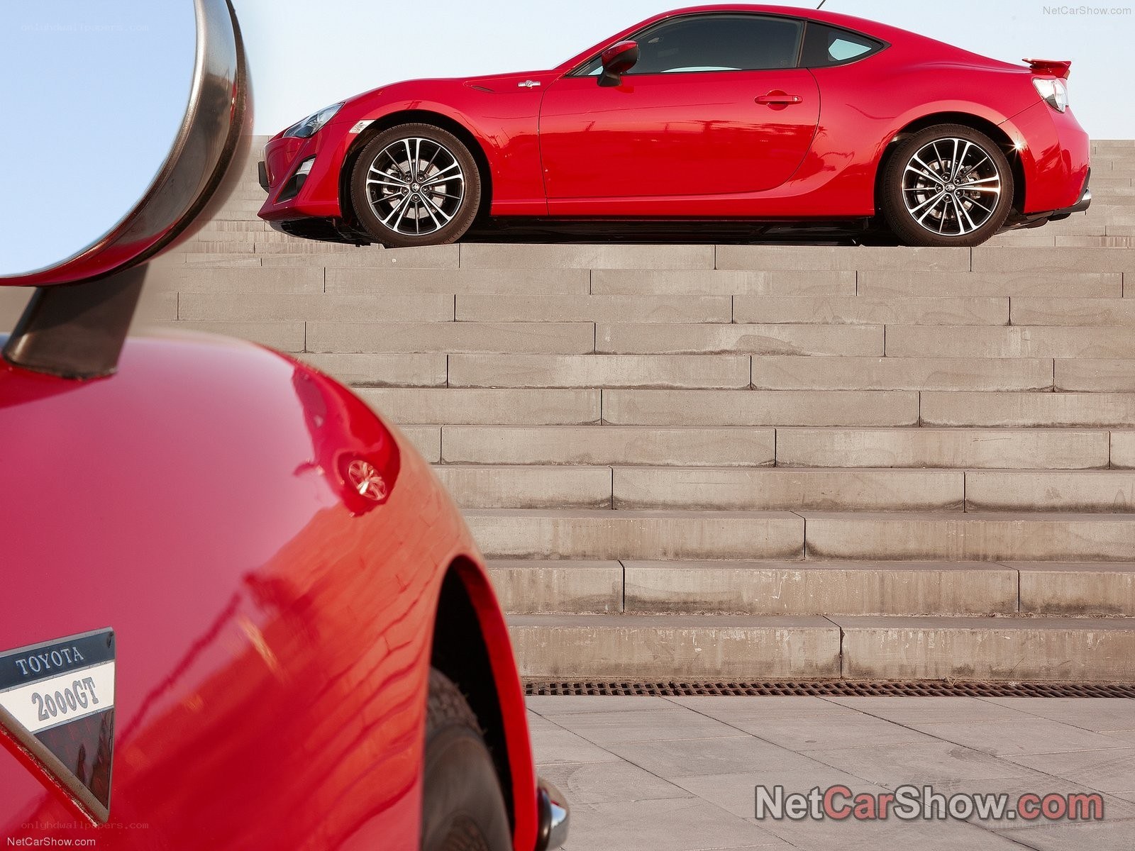 Red Toyota 86 on steps