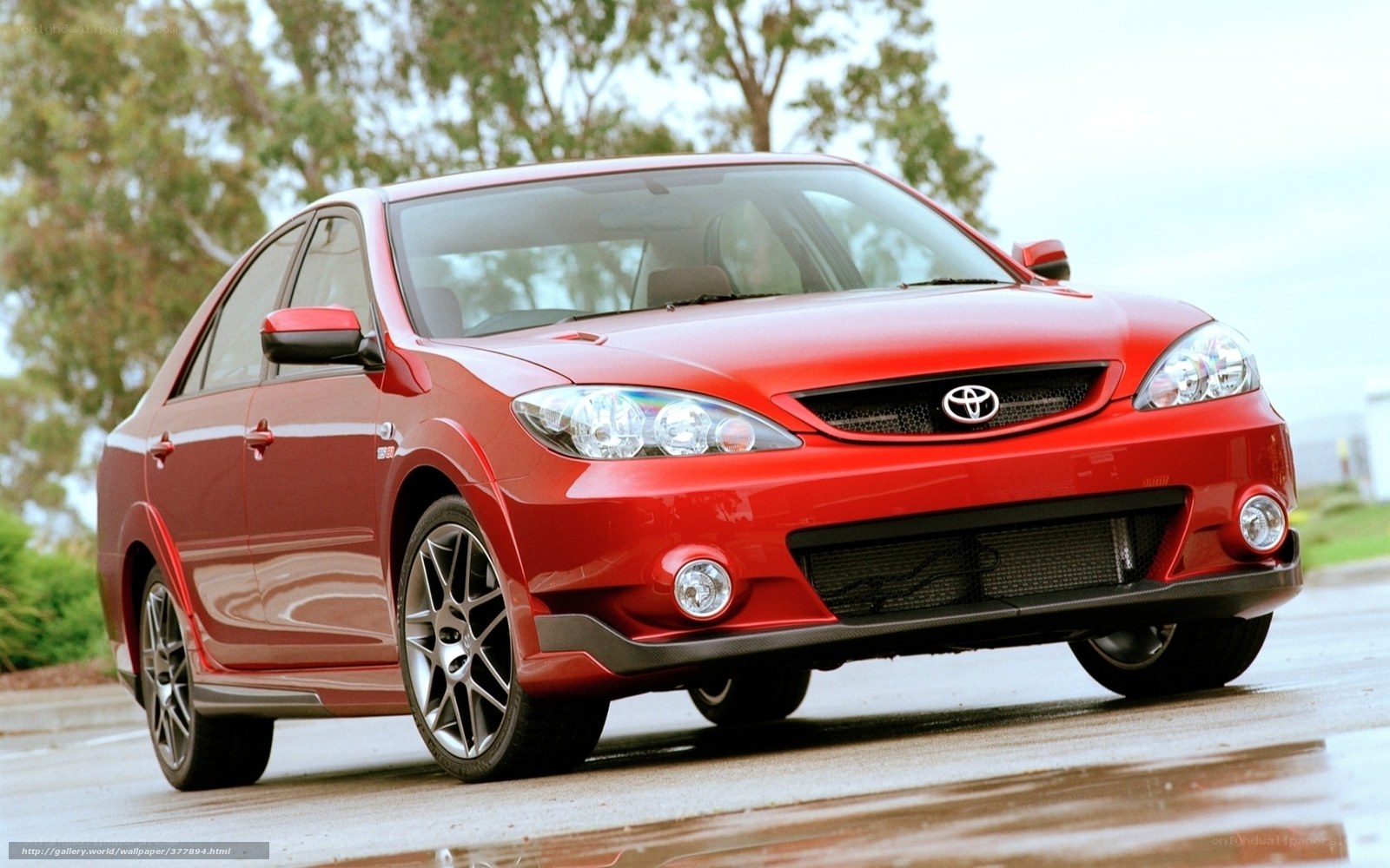 red toyota corolla sedan