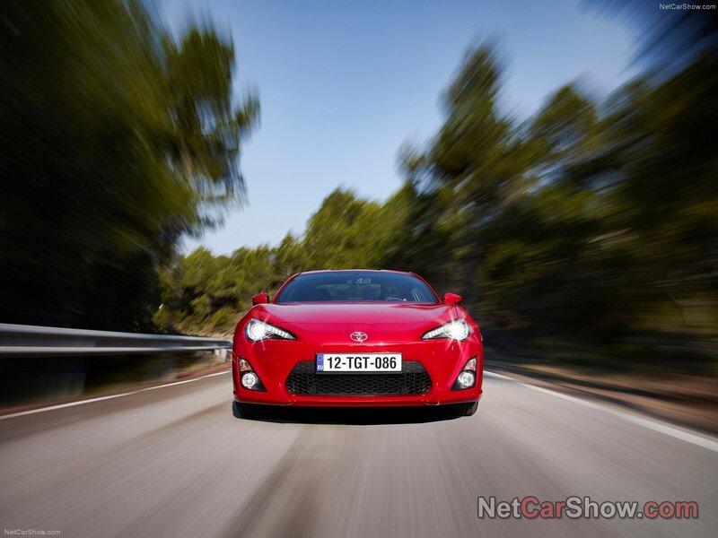 Red Toyota GT-86 in motion