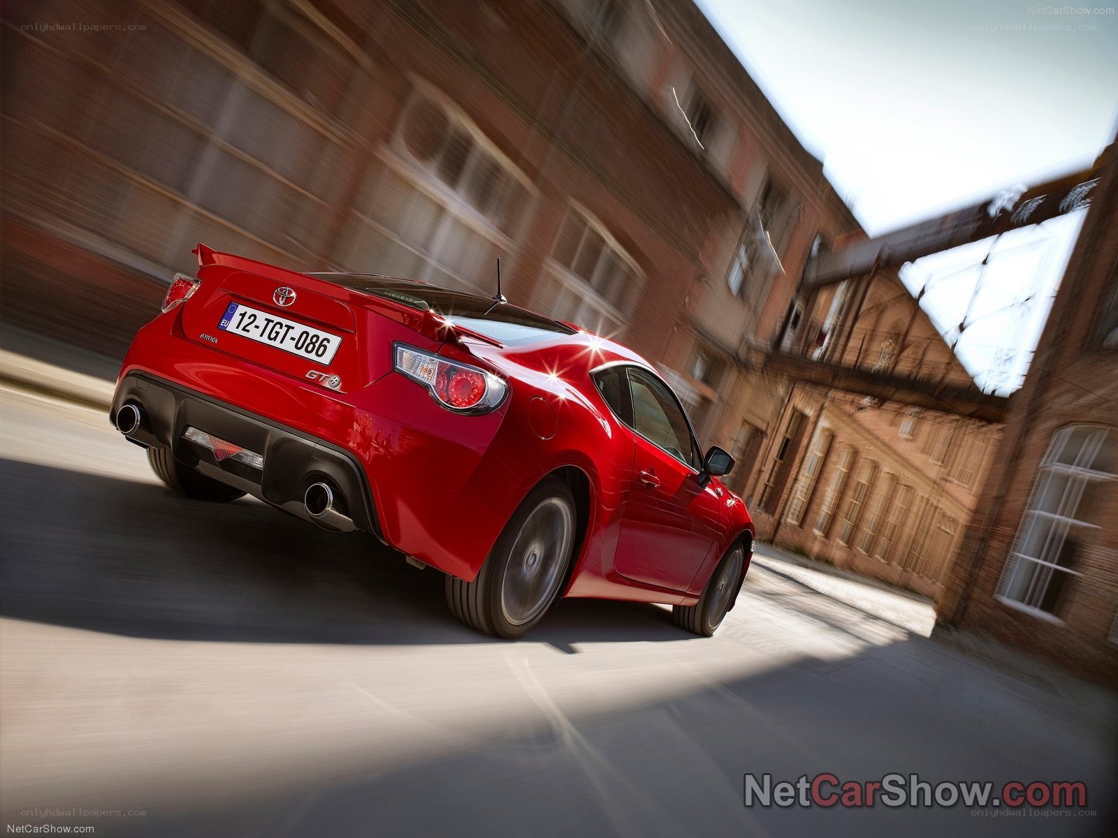 red toyota gt-86 in motion