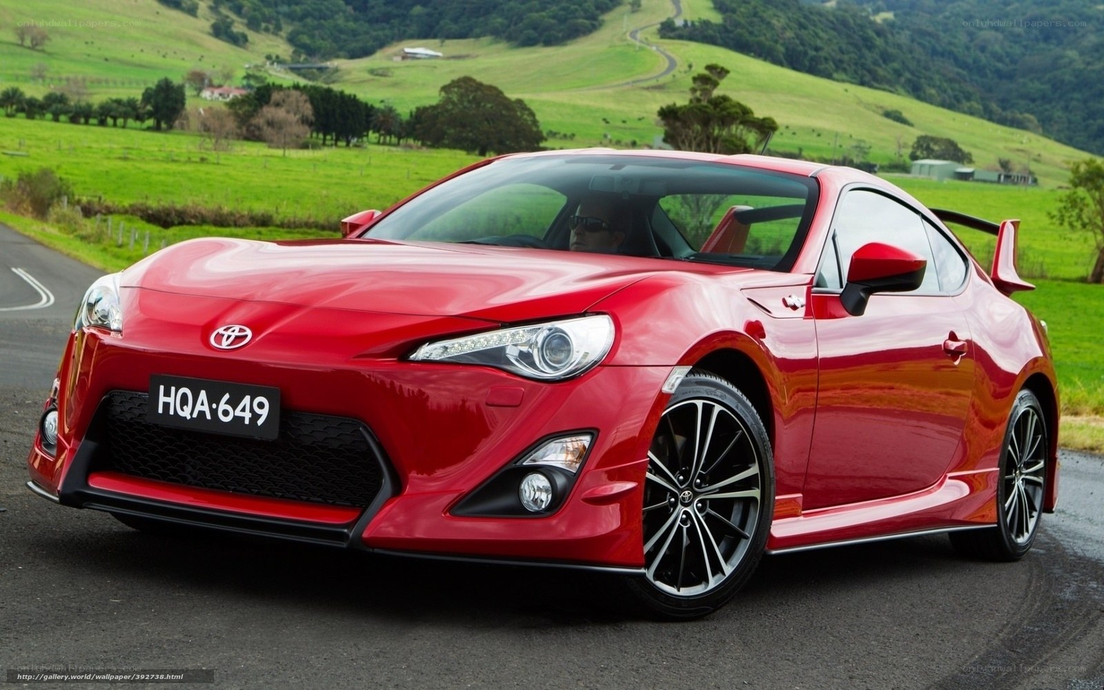 Red Toyota GT86 on a country road