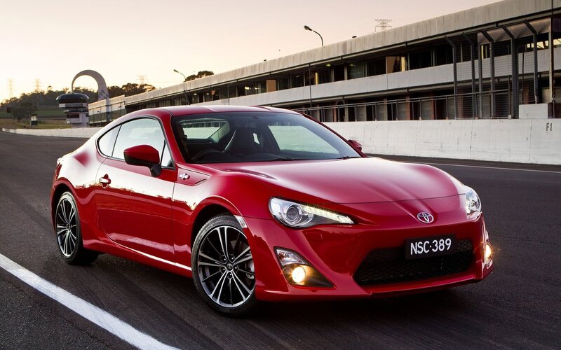 Red Toyota GT86 on a racetrack