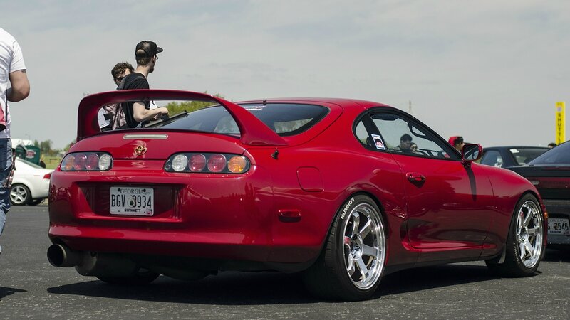 Red Toyota Supra at car show