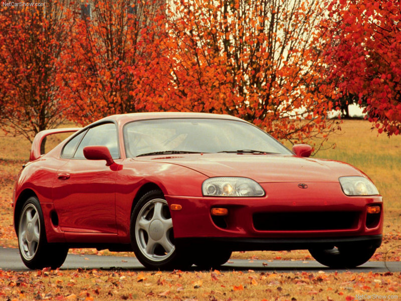 Red Toyota Supra in autumn