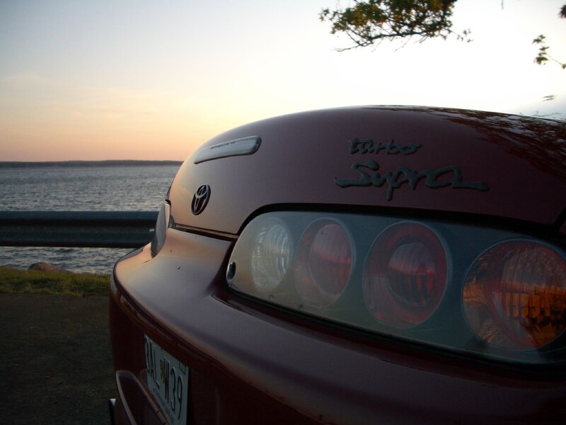 Red Toyota Supra — Maroon