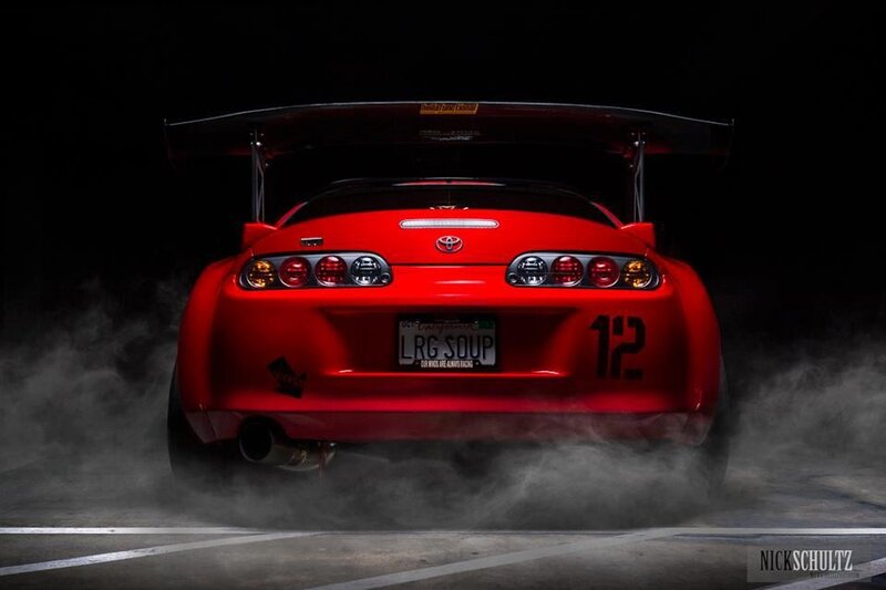 Red Toyota Supra rear view