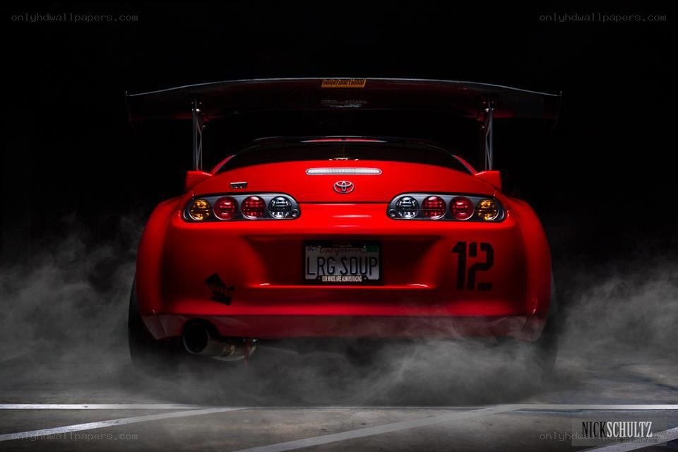 Red Toyota Supra rear view