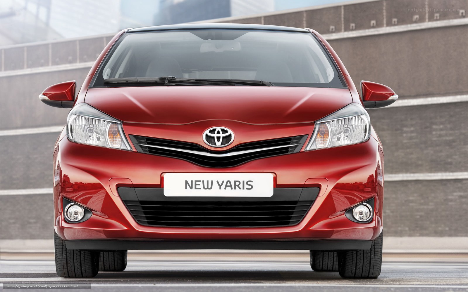 Red Toyota Yaris front view