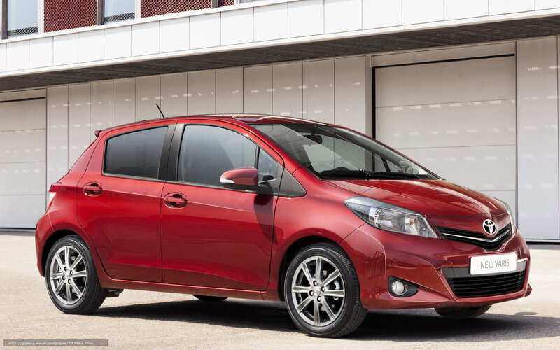 Red Toyota Yaris hatchback