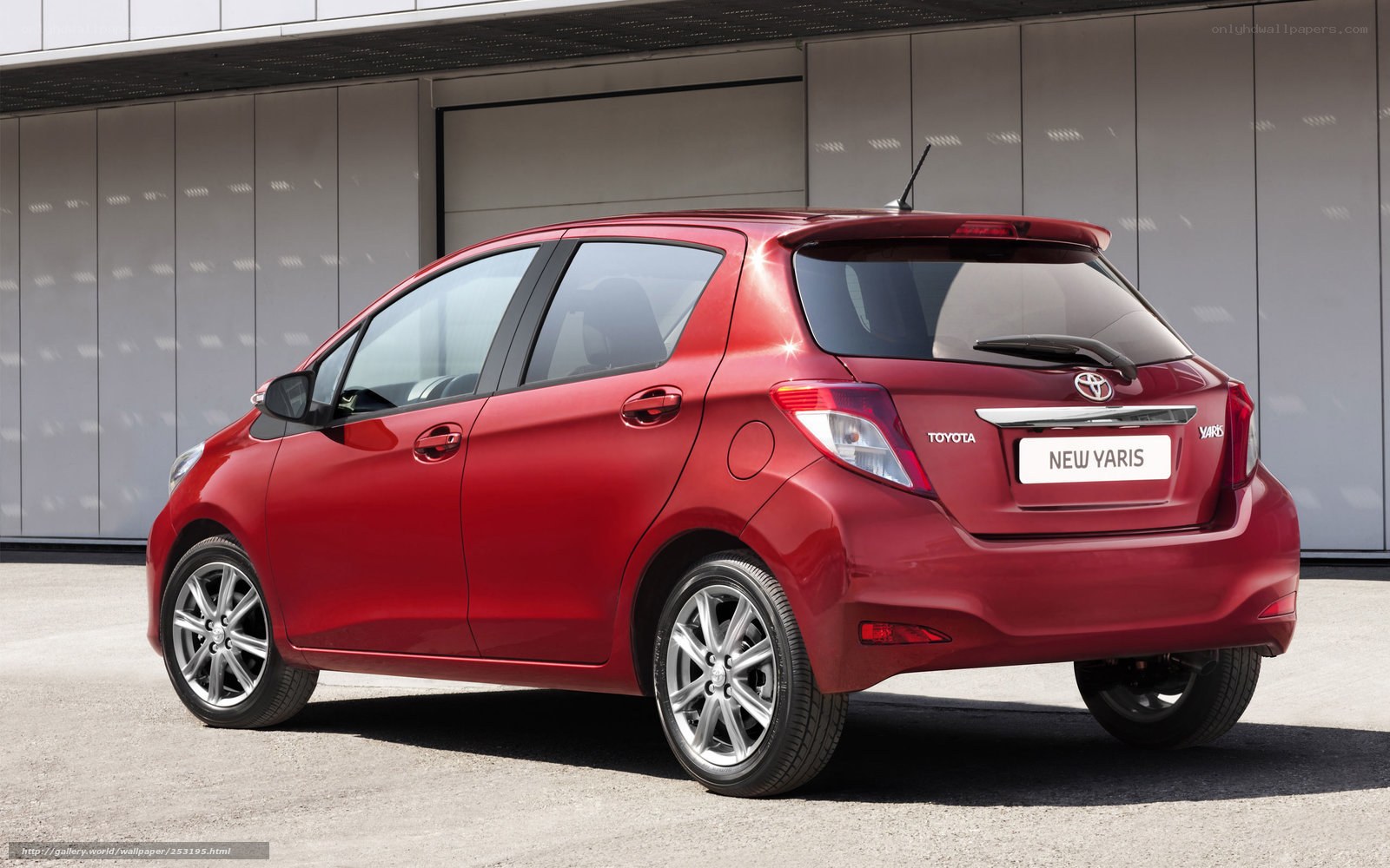 Red Toyota Yaris hatchback