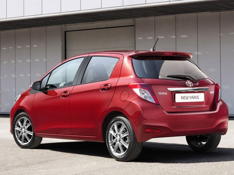 Red Toyota Yaris hatchback