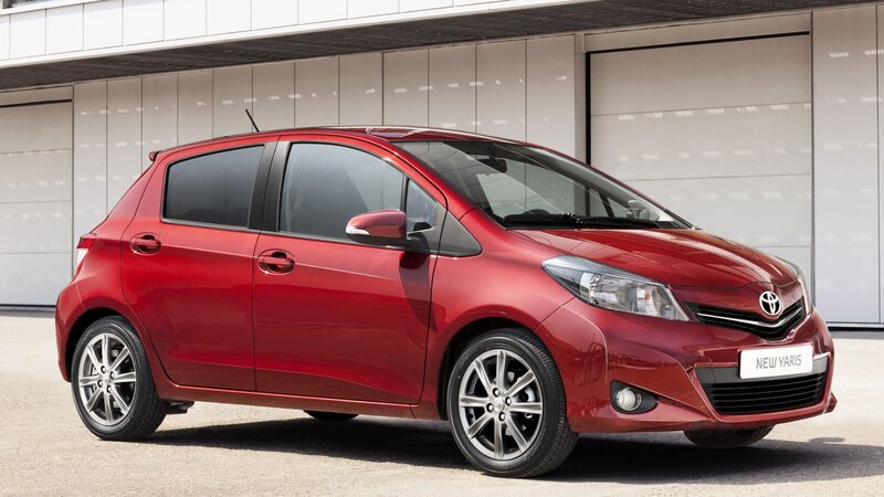 Red Toyota Yaris hatchback