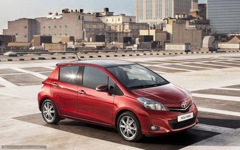 Red Toyota Yaris on rooftop