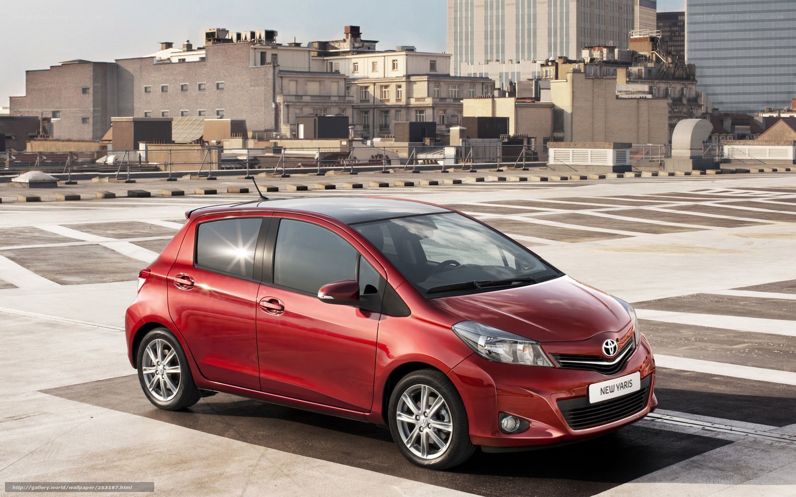 Red Toyota Yaris on rooftop