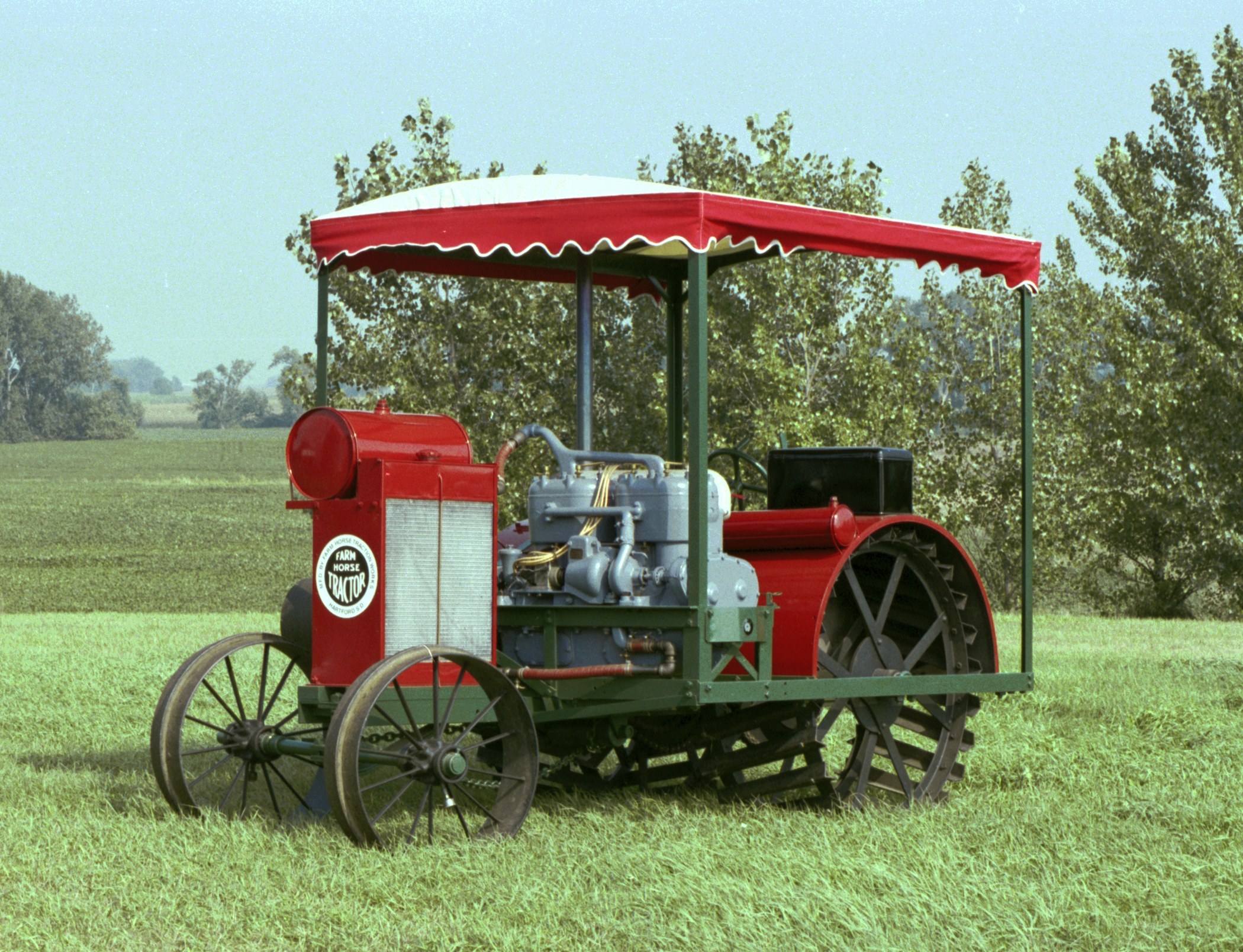 Red tractor in a field
