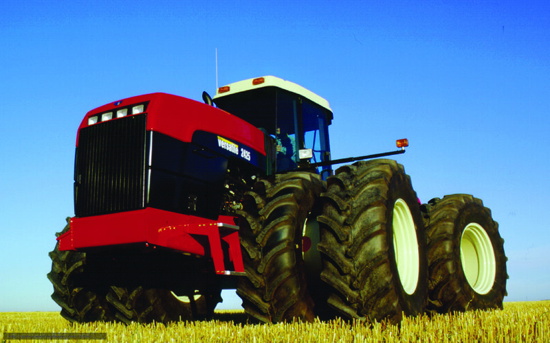 Red tractor in a field