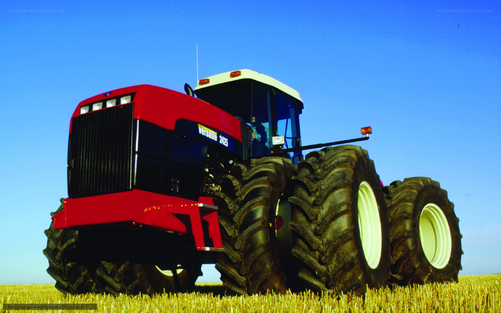 Red tractor in a field