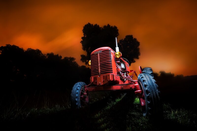Red Tractor in Field — Orange, Dramatic