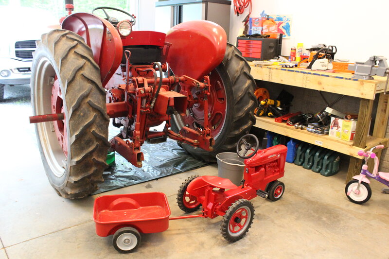 Red Tractor in Garage