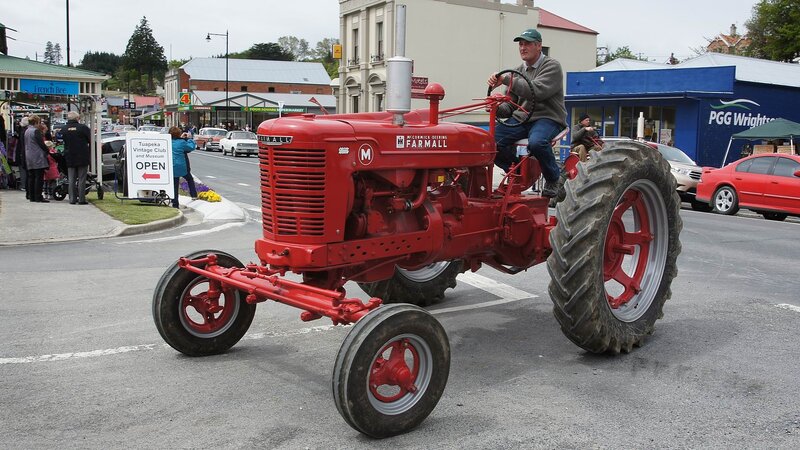 Red Tractor on Street