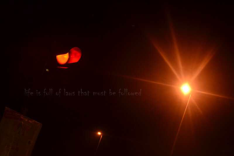 Red Traffic Light at Night — Black