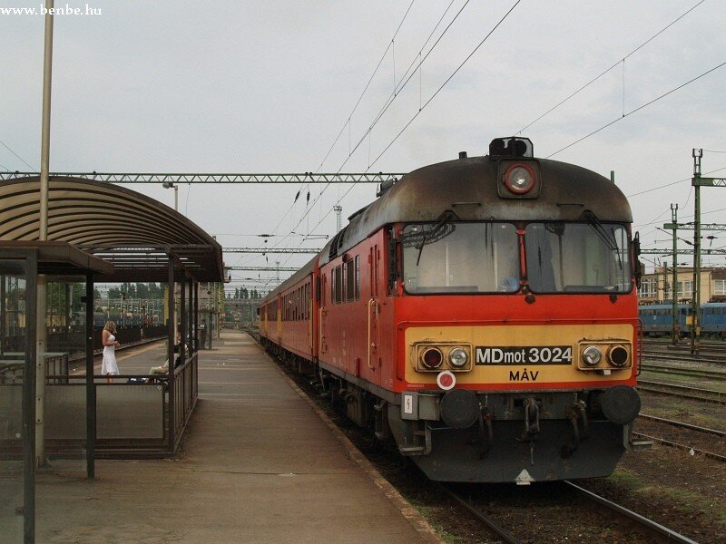 Red train at a station