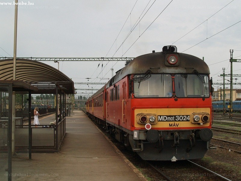 Red train at a station