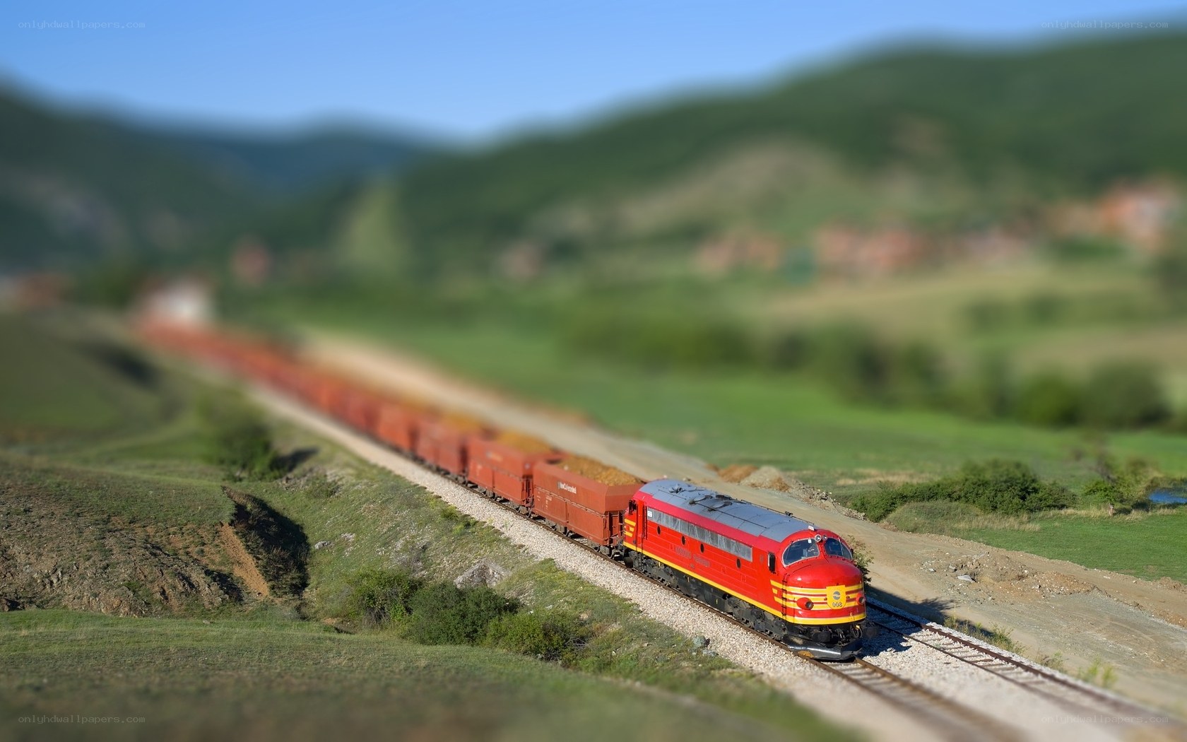 Red train in a scenic landscape