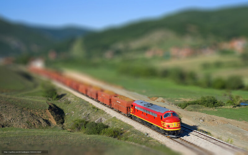 Red train in green valley