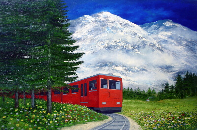 Red train in mountain landscape